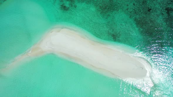 Aerial above abstract of relaxing bay beach vacation by blue lagoon and white sandy background of a 