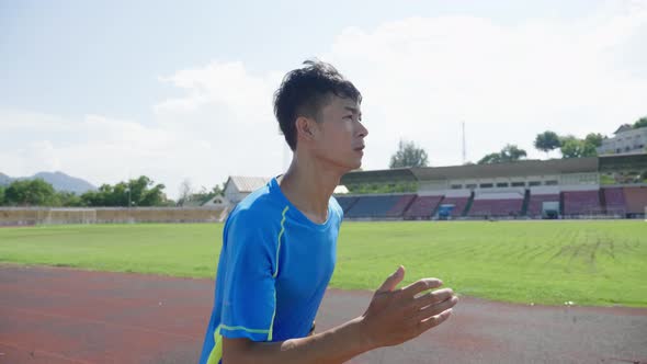 Athlete Running At The Stadium