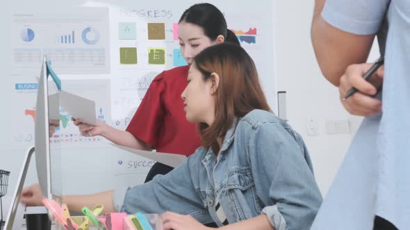 Group of asian young creative happy people casual dress entrepreneur on a presentation