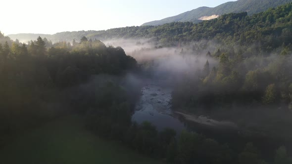 Flying above the river and fog