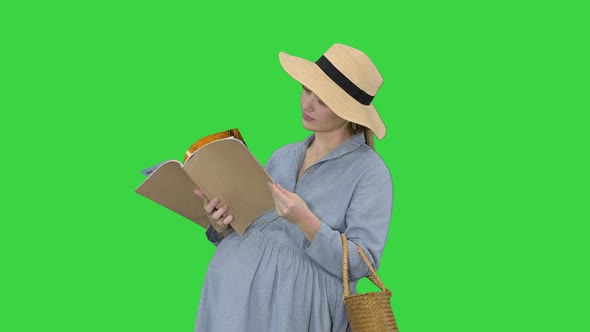 Pregnant Woman Summer Hat Reading Magazine Green Screen Chroma Key