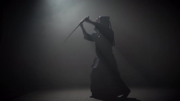 Kendo Instructor Practicing Martial Art with the Katana Sword.