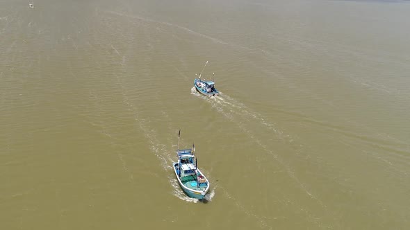 Flyover Two Passing Fishing Boats