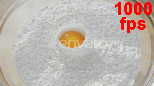 Egg in Flour in slow motion