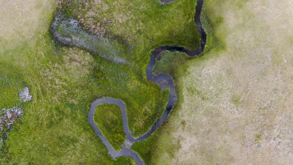 Aerial View of Green Land and Small Curve River in Aspen Springs