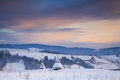 Snowy haystack on the background of the Carpathian Mountains and - PhotoDune Item for Sale