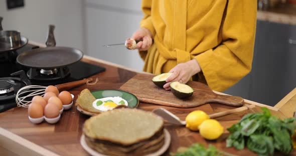 Preparing Healthy Breakfast on the Kitchen Table