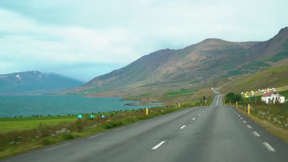 Car Driving on the Road To Iceland