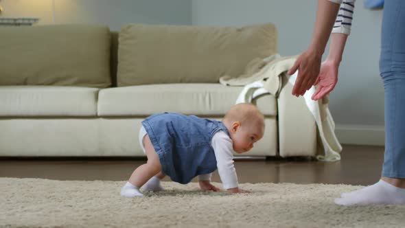 Baby Girl Crawling Towards Mom