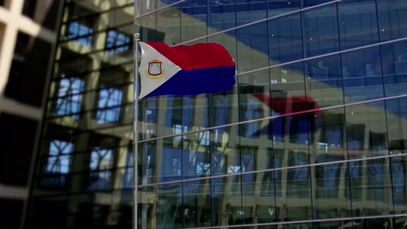 Saint Martin Flag Waving On A Skyscraper Building