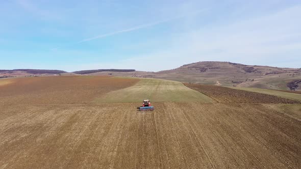 Agricultural Combine Working on the Field