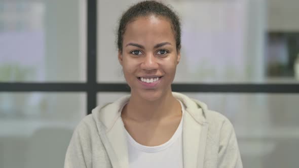 Portrait of Attractive African Woman Smiling at Camera