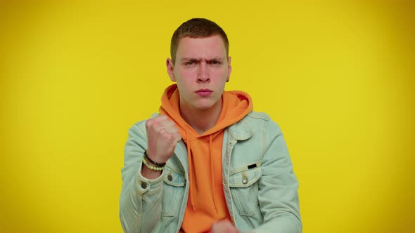 Aggressive Angry Man Trying to Fight at Camera Shaking Fist Boxing with Expression Punishment