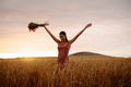 Woman enjoying a day in wheat field - PhotoDune Item for Sale