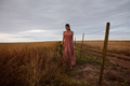 Woman walking in a field with flowers - PhotoDune Item for Sale