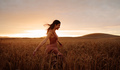Carefree female strolling in the wheat field - PhotoDune Item for Sale