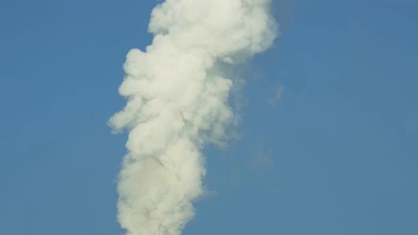 White Smoke Against Blue Sky