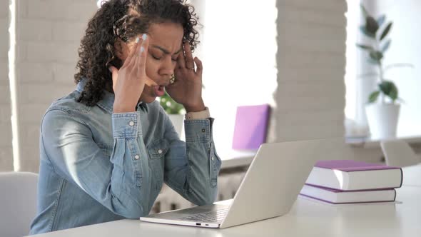 Headache Tense Creative African Girl Working on Project