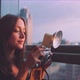 Woman photographer taking a picture of a skyline, smiling - VideoHive Item for Sale