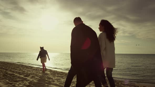 Calm People Enjoy Holiday at Sunset Sea Beach