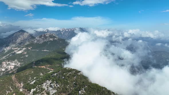 Cloudy landscape high in the mountains aerial view 4 K