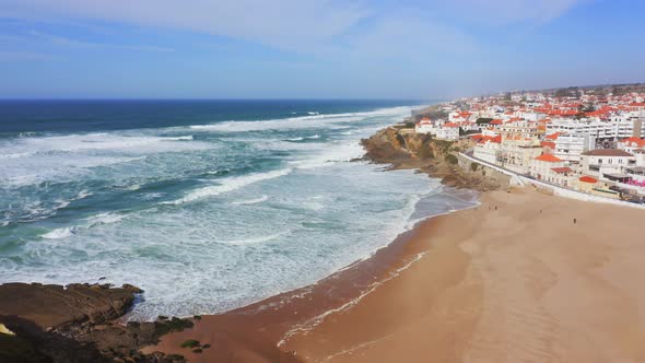 Aerial Drone View of Sandy Beach at Lisbon, Portugal at Praia das Macas, a Beautiful Coastal Town, P