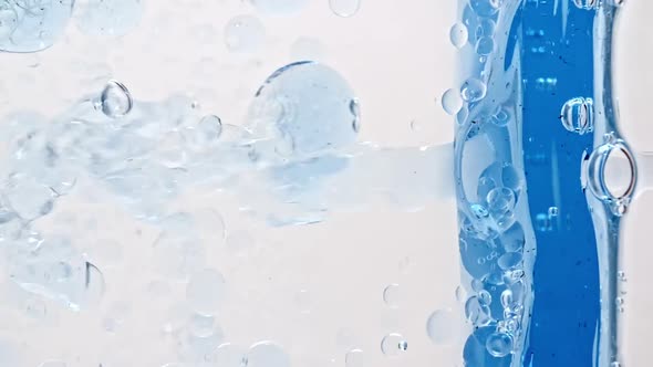 Blue Wave Water with Bubbles on White Background