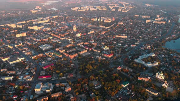 Aerial Panoramic Shot of Small European City Placed on River Banks, Drone Flying High