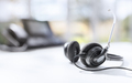 Headset headphones telephone on desk in call center - PhotoDune Item for Sale