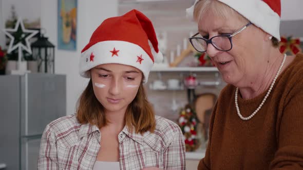 Grandmother Teaching Granddaughter How Sift Flour Ingredient Preparing Homemade Delicious Dessert