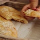 Girl Breaking Freshly Baked Ciabatta at Home - VideoHive Item for Sale