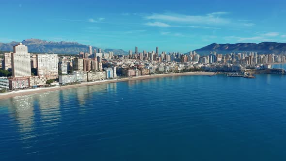 Aerial Footage of Benidorm Playa Levante Beach, Hotels, Buildings, Restaurants and the Coastline and