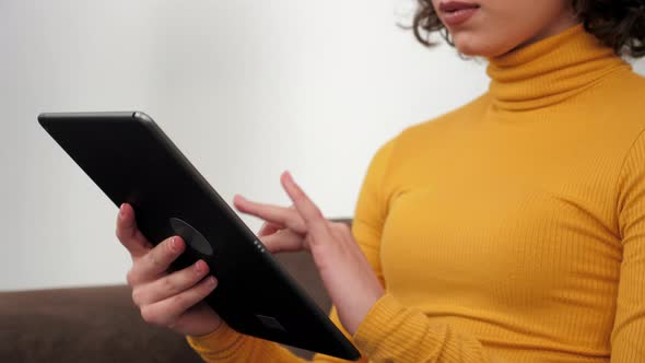 Close Up Hands Woman Designer Uses Tablet Tapping and Scrolling Screen Display