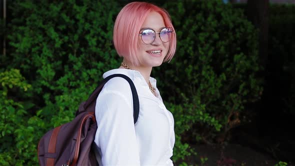 Portrait of a Female Student with Pink Hair