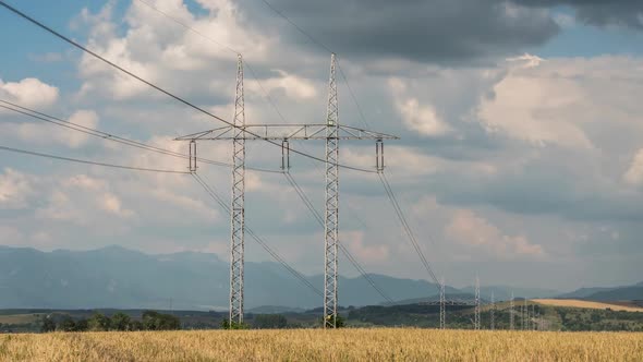 Clouds Moving over Electric Energy Power Line