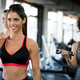 Beautiful fit women working out in gym to stay healthy Stock Photo by nd3000