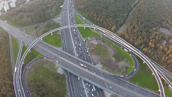 Flying over city traffic on transport intersection