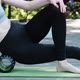 Sports Girl Massages the Muscles of the Thigh with Myofascial Roller - VideoHive Item for Sale