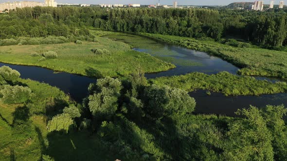 Top View of the Ruins of an Old Mill in Loshitsky Park in Minsk and the Svisloch River at Sunset