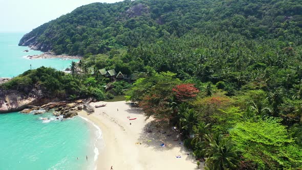 Aerial travel of tropical resort beach time by blue green lagoon with white sandy background of a da