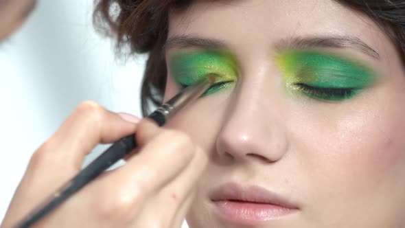 Makeup Artist Applying Eyeshadow.