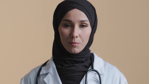 Islamic Arabian Woman Female Doctor Cardiologist Adviser in Hijab Talking at Camera Virtual Video