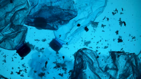 Underwater Footage of Plastic Pollution Problem Concept in Ocean