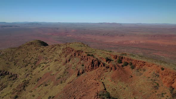 Summit of Mt Bruce, Karijini National Park, Western Australia Sunrise Sunset 4K Aerial Drone