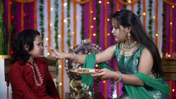 Indian Family Celebrating Raksha Bandhan Festival