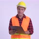 Young Happy Hispanic Man Construction Worker Showing Clipboard and Giving Thumbs Up - VideoHive Item for Sale