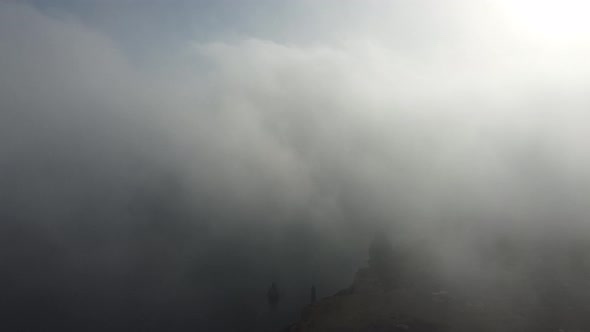 High Above the Thick Fog Like Beautiful Ocean of Clouds at Sunrise