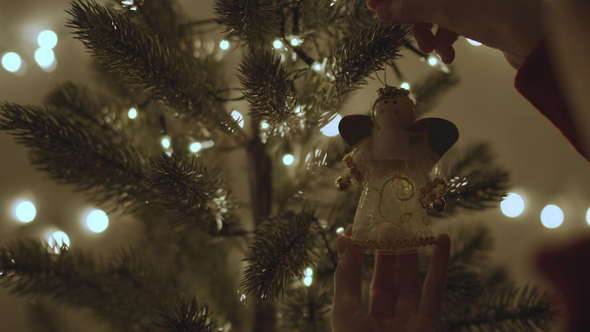 White Angle Decoration On Christmas Tree