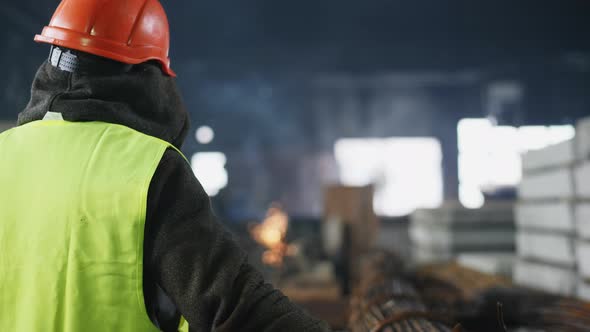 Back View Portrait of a Worker in the Hardhat