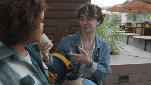 Happy Guy Hanging Out with Friend Outdoors